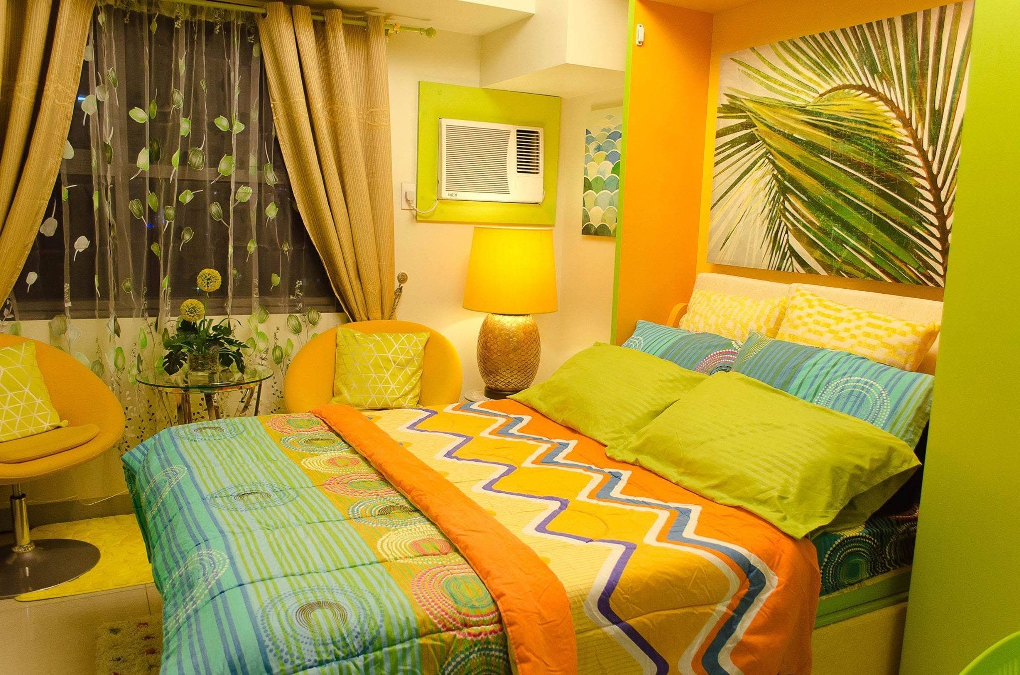 Bright tropical-themed bedroom with green and yellow accents